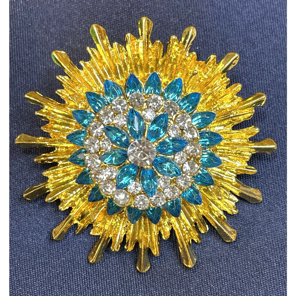 Sunburst Flower Brooch Pin Blue Glass Rhinestone Clear Stones Gold Toned - Picture 1 of 3